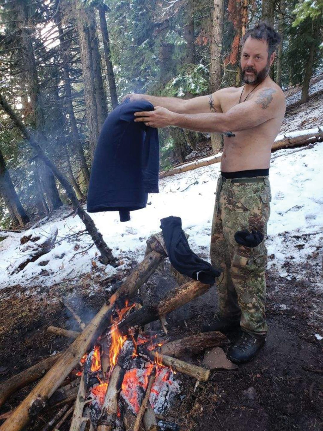The comfort of a fire to keep warm as well as dry out clothing was welcomed and did not bother the elk.